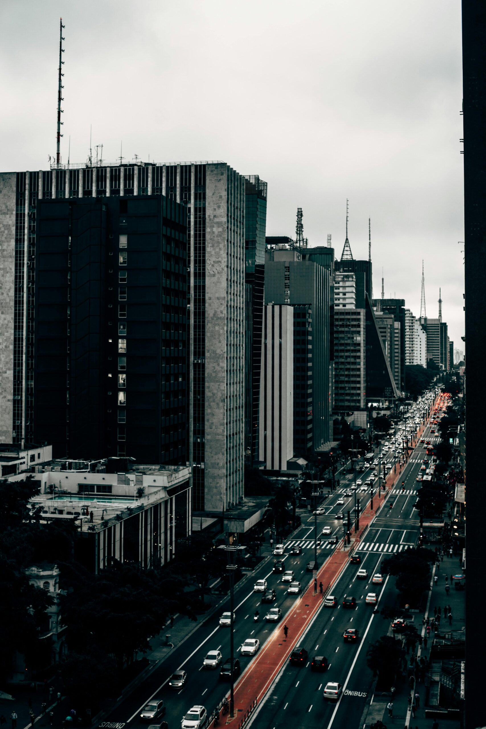 Capture of Avenida Paulista in São Paulo showcasing urban life with towering skyscrapers.