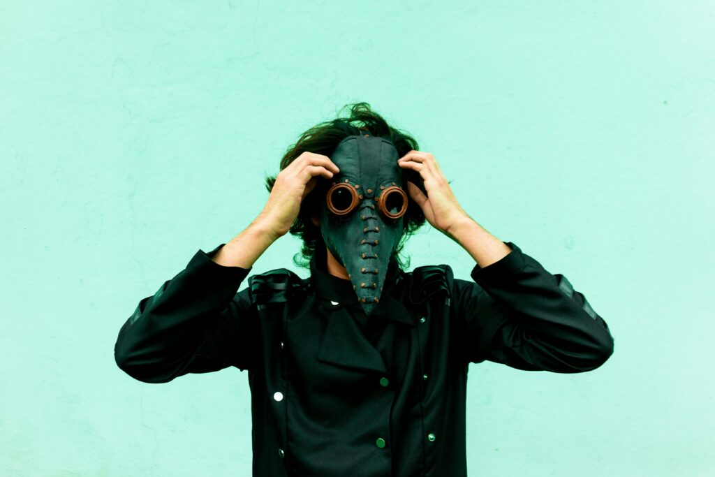 A person wearing a vintage plague doctor mask in Toluca de Lerdo, México.